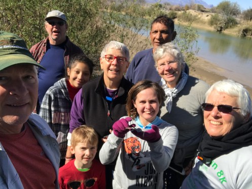 Mision de Candelilla team members gather at the river